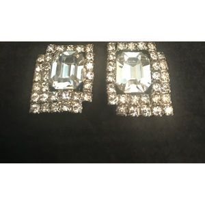 Vintage clear Rhinestone Earrings. Unique design with emerald cut center stone.